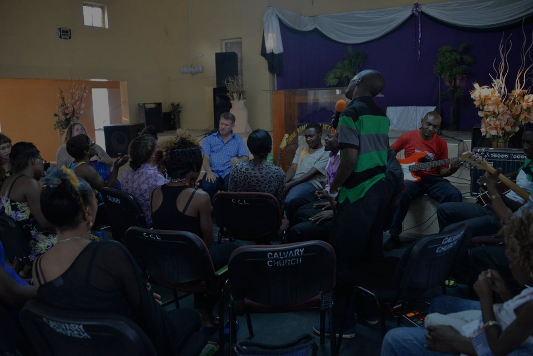 A congregation gathered in a hall in Zambia