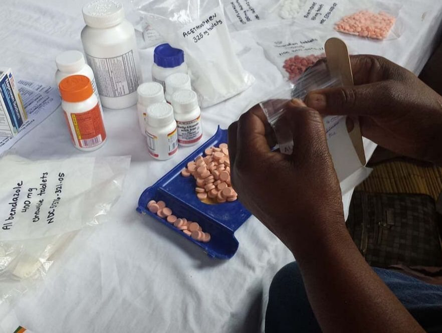 Medicine bottles being sorted at a clinic